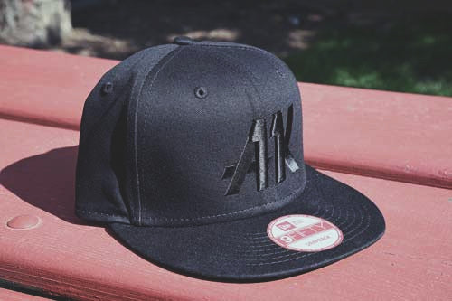 AK11 black-on-black snapback from the left