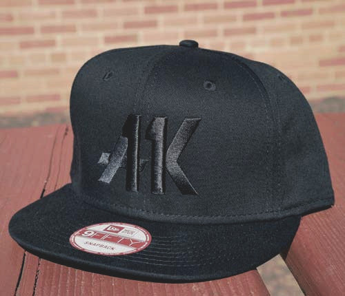AK11 black-on-black snapback from the right